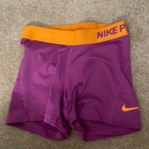 SMALL nike pros two tone purple and orange